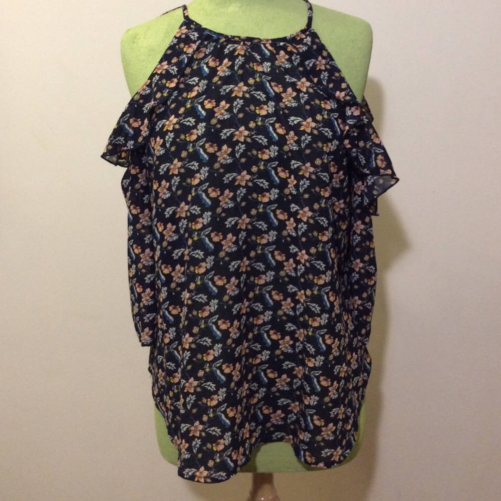 Ruffled open shoulder shirt